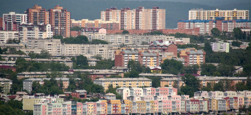 город